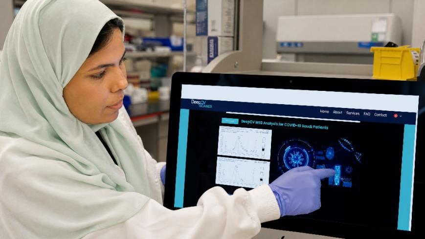 Researcher reviewing biomedical images in a laboratory